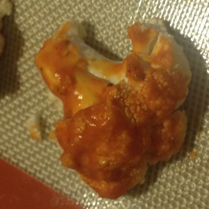 Brushed on buffalo sauce after allowing cauliflower to bake for 20 minutes